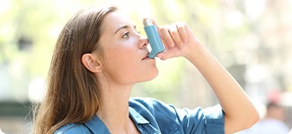 Woman and inhaler Woman and inhaler